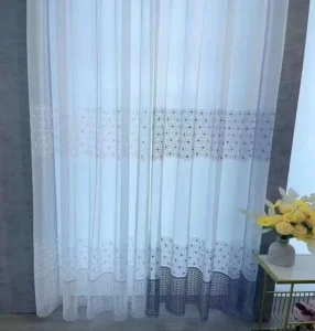 Elegant Tulle Fabric Wholesale - Lightweight for Wedding & Home Decor 帮助搜索引擎识别图片主体，关联产品场景 Title Elegant Tulle Fabric Wholesale 完善标题，强化核心关键词关联 Caption High-quality tulle fabric available for wholesale, ideal for wedding backd