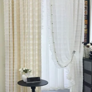 Close up of semi sheer linen look fabric with fringe detail