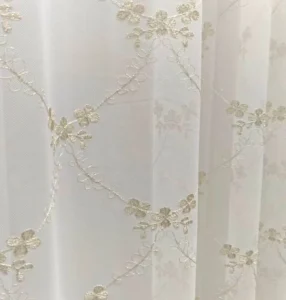 luxury-white-tulle-fabric-with-flower-embroidery-rolls