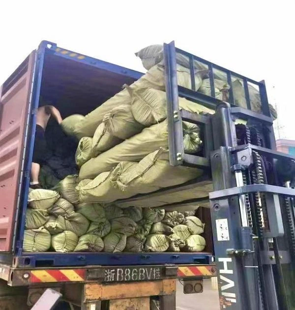 Loading mixed container of cheap blackout curtain fabric rolls in China factory