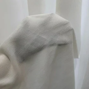 Modern wave pattern sheer drapes hanging in luxury living room