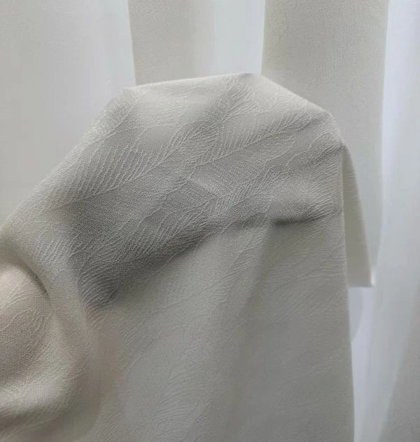 Modern wave pattern sheer drapes hanging in luxury living room