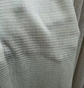 Close-up detail of lightweight sheer leno weave voile fabric