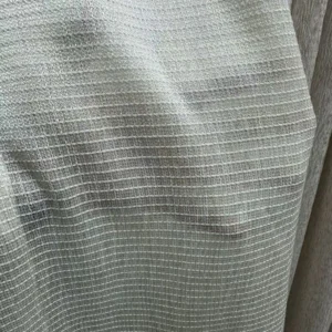 Close-up detail of lightweight sheer leno weave voile fabric